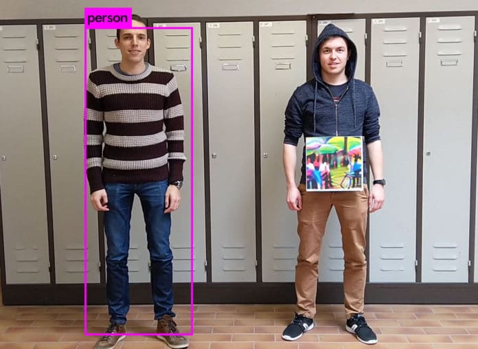 Left: The person without a patch is successfully detected. Right: The person holding the patch is ignored.