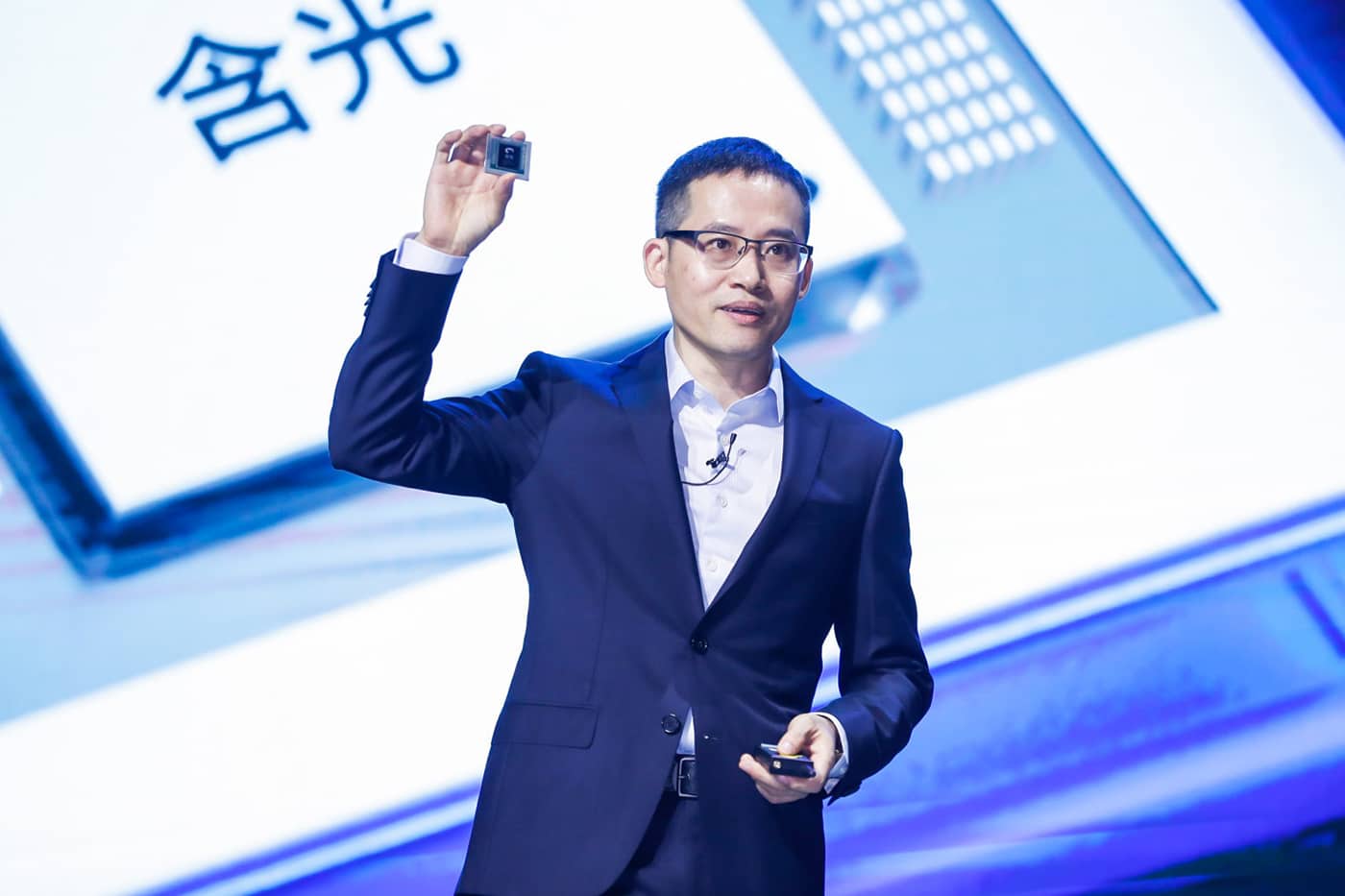 Jeff Zhang, Alibaba Group CTO shows the company's first AI inference chip called Hanguang 800.