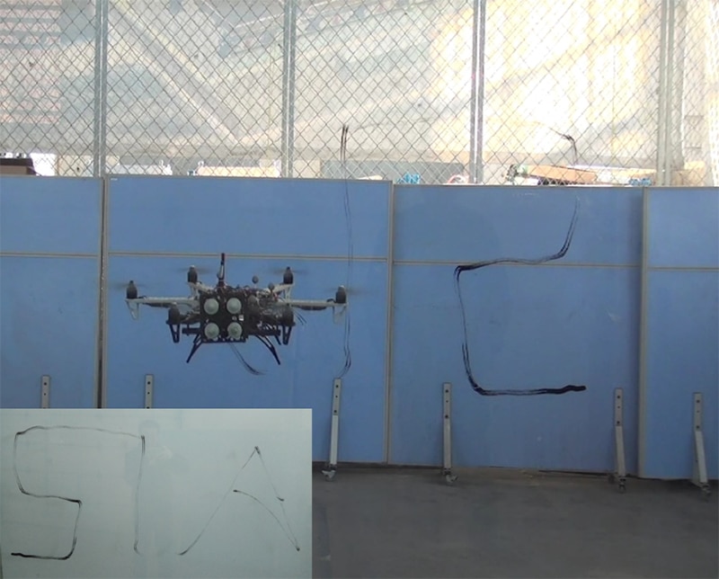 The hexacopter drone perform writing task.