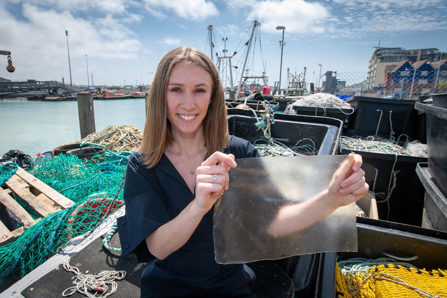 Product design student Lucy Hughes has invented a bioplastic created from fish skin and scales and red algae. Credit: University of Sussex
