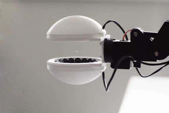 Robotic hand capable of grasping objects without touching them.