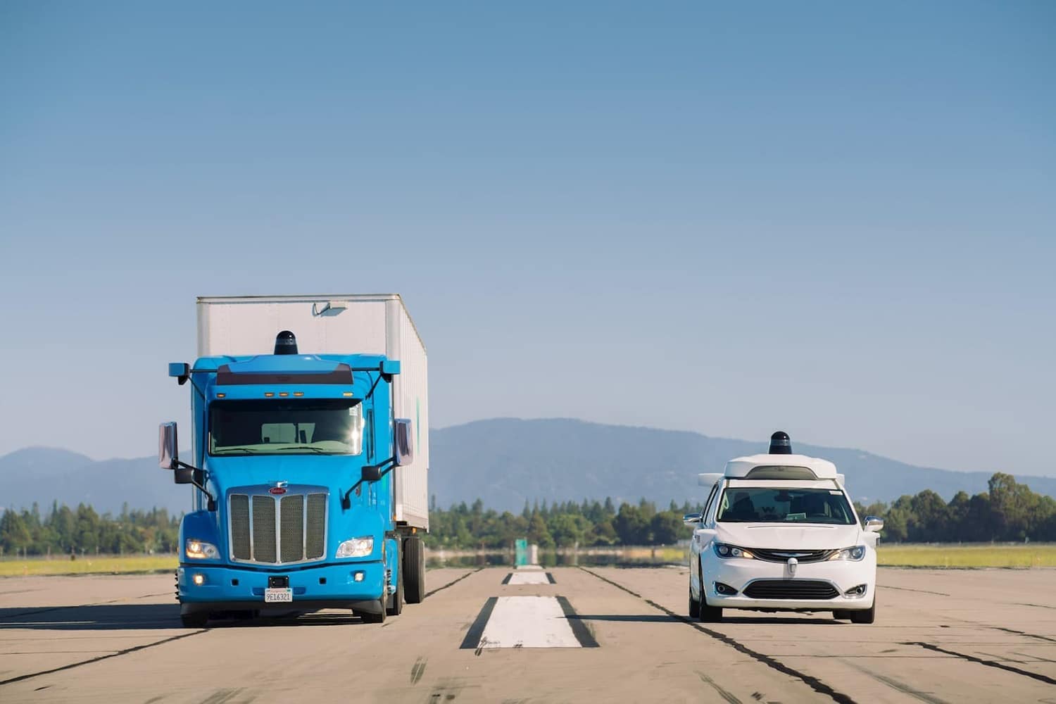 Waymo's self-driving truck and Chrysler Pacifica minivan.