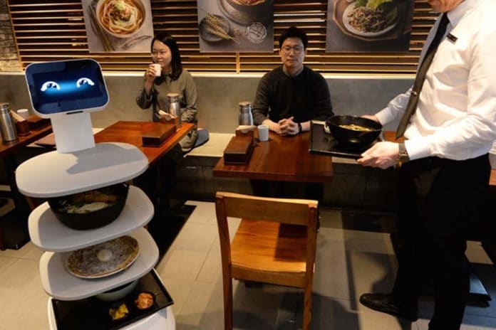 Robot waiter LG CLOi ServeBot started serving customers at restaurants in Seoul.