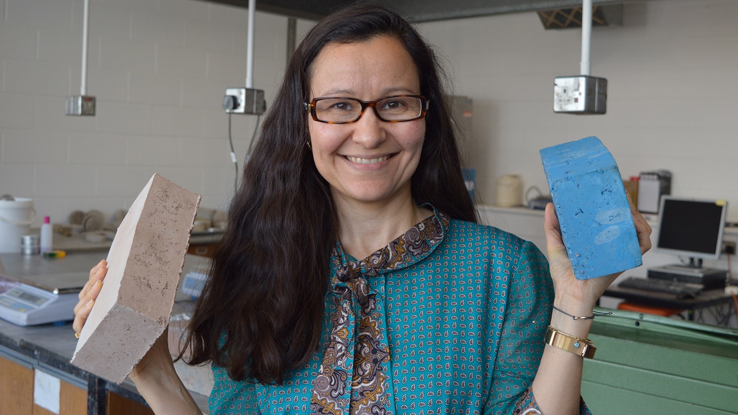 Professor Gabriela Medero with sustainable building bricks.