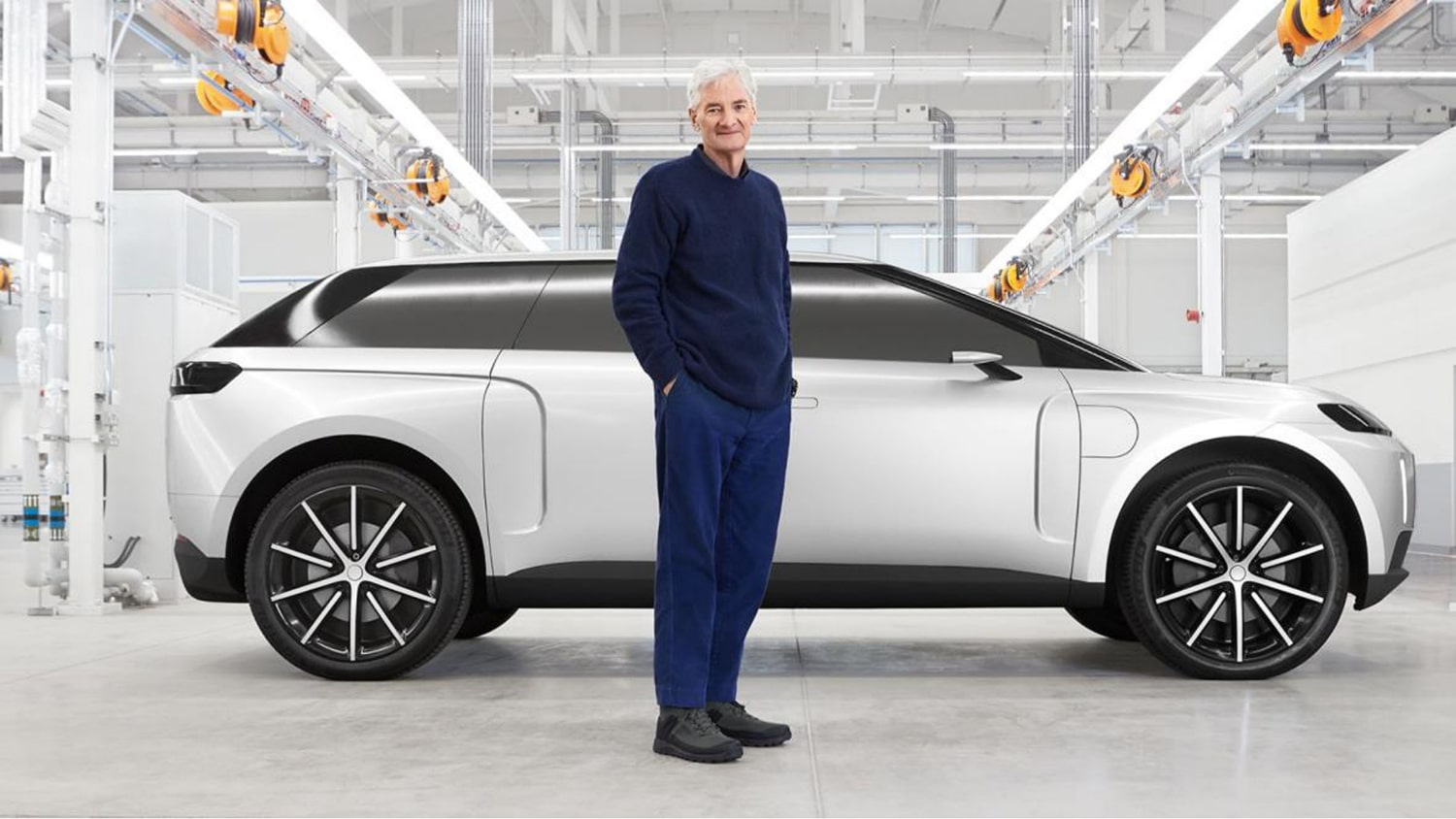 James Dyson with the prototype of his abandoned electric car.