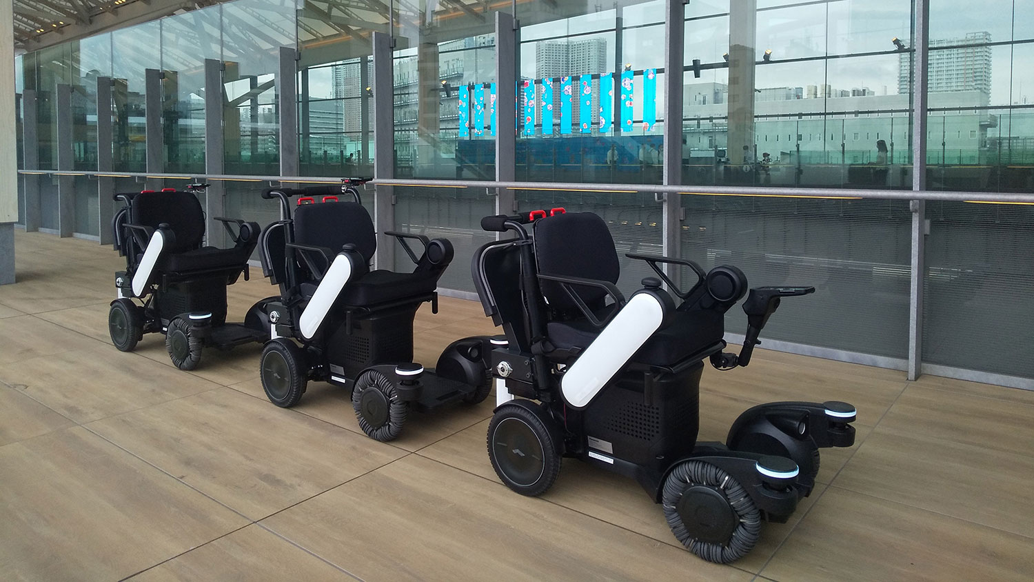 Panasonic trials its robotic mobility service at Tokyo railway station.