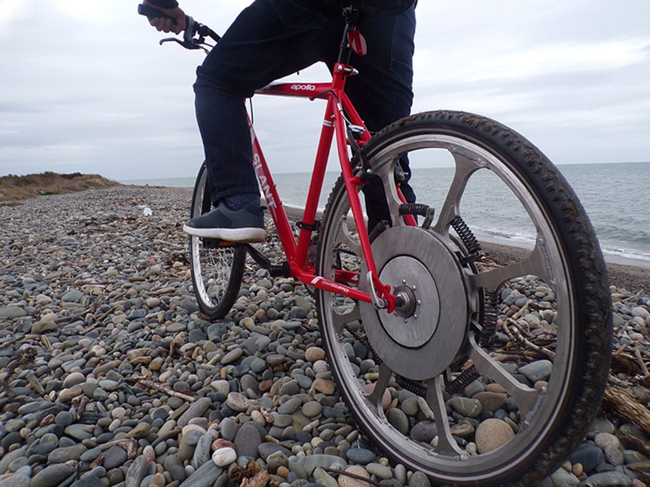 SuperWheel turns your bike into a power-assisted bike with unlimited range.