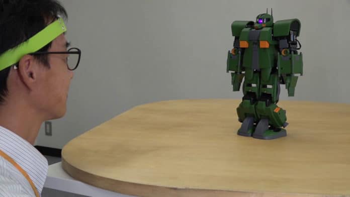 New device allows anyone to control mini Gundam robot with their mind.