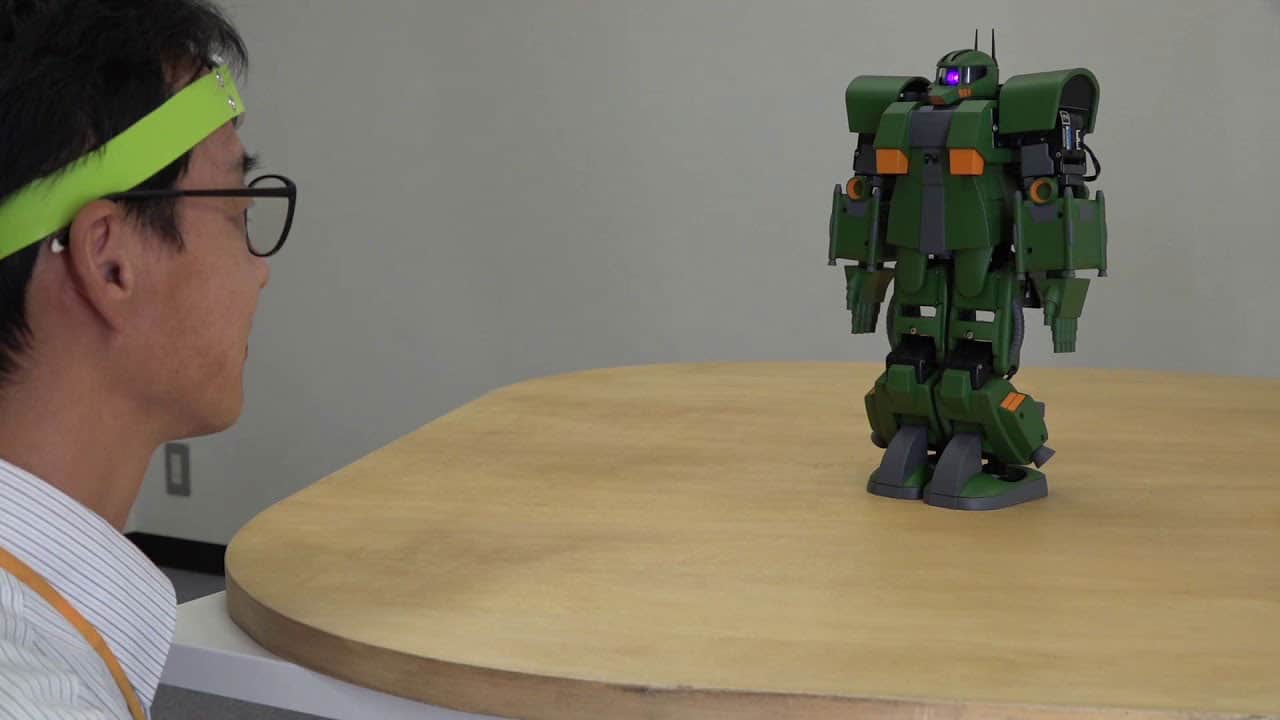 New device allows anyone to control mini Gundam robot with their mind.