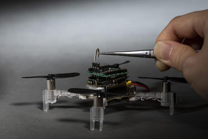 A palm-sized Smellicopter drone uses live moth antenna to seek out smells