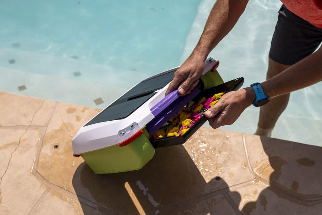A solar-powered Ariel robot pool cleaner wipes out the debris.