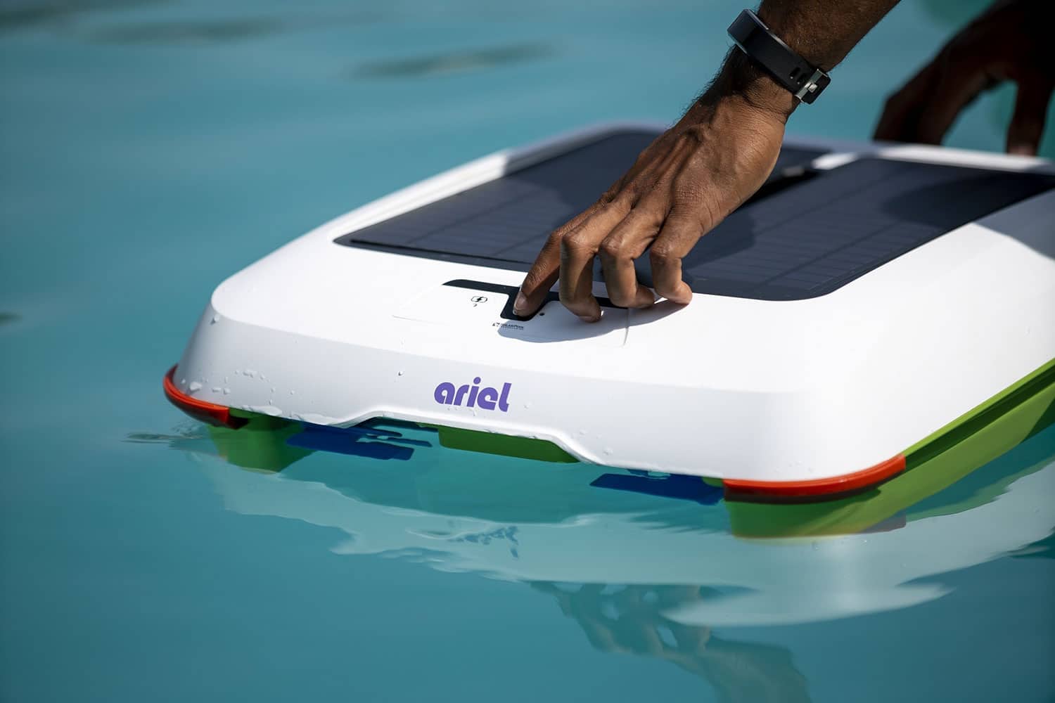 A solar-powered Ariel robot pool cleaner wipes out the debris.