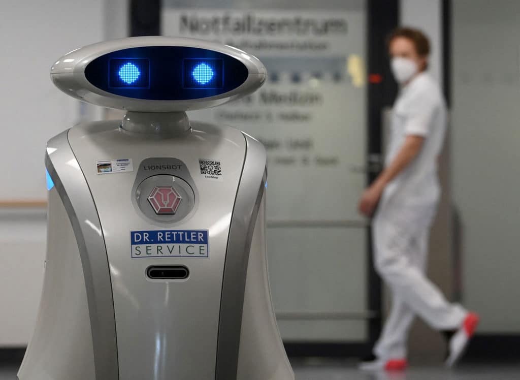 Franzi, a talkative robot that cleans, and cheers up patients at a German hospital.