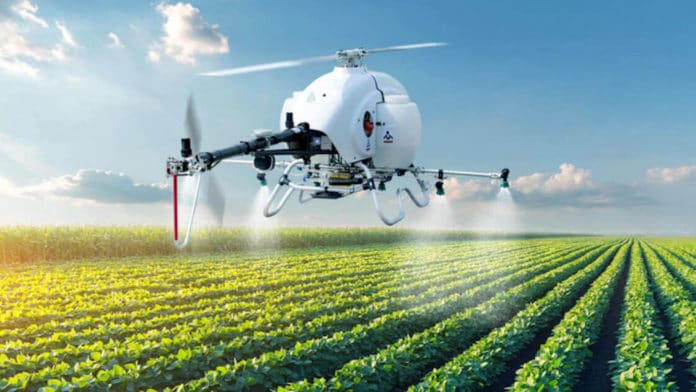 This long endurance autonomous helicopter sprays crops with high efficiency.