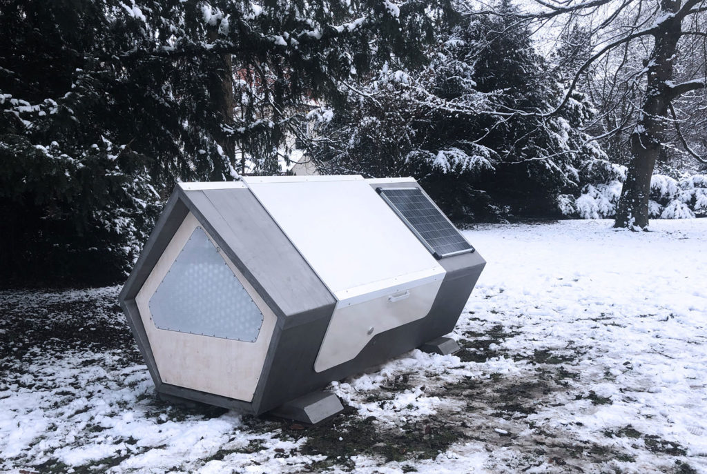 A German city tests solar-powered sleeping pods to protect homeless people in winter.
