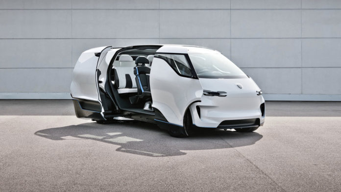 Porsche reveals the interior of the Vision Renndienst electric minivan.