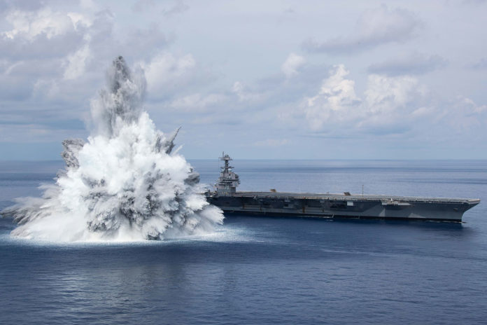 During test, the first-in-class aircraft carrier withstood the impact of three 40,000-pound underwater blasts.