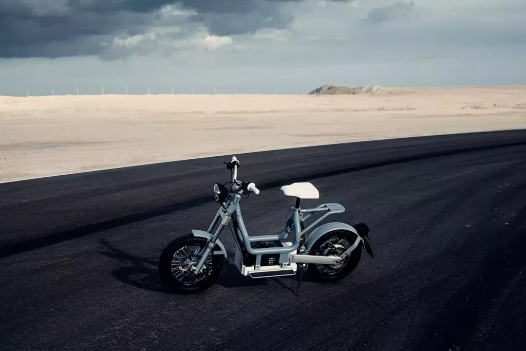 The e-moped comes in white or gray and is street legal in both the U.S. and Europe.