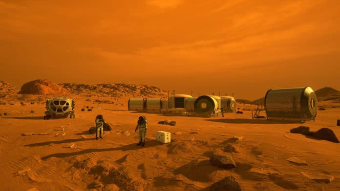 Artist's conception of astronauts and human habitats on Mars.