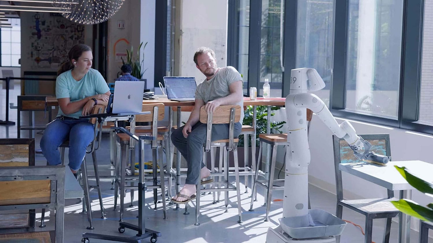 Alphabet’s Everyday Robots test fleet performs some custodial tasks around offices.