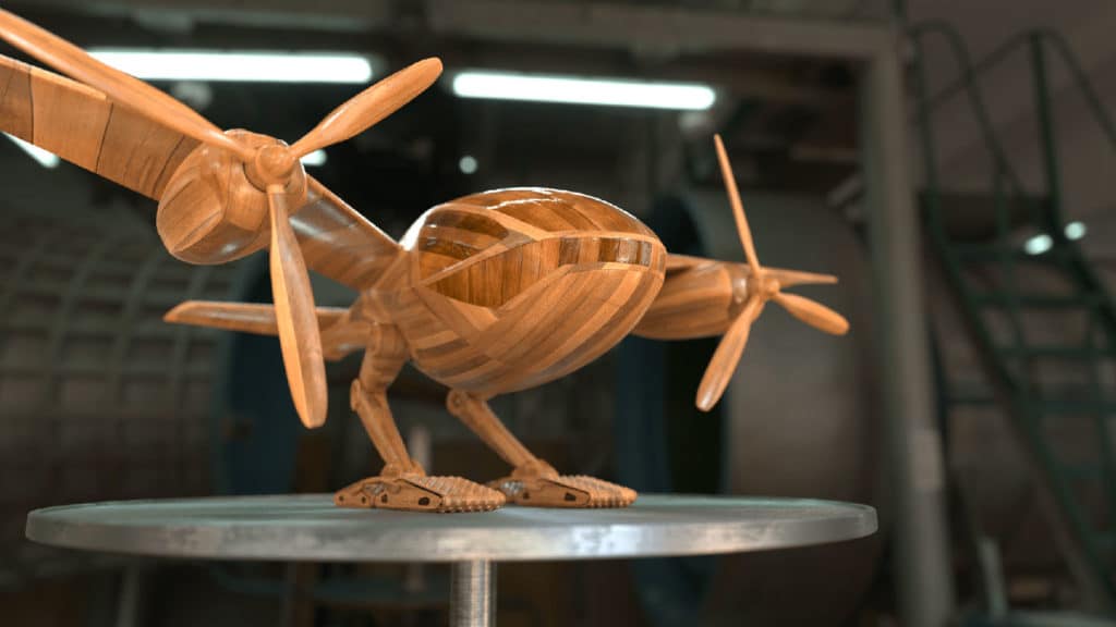 A small wooden Macrobot model.