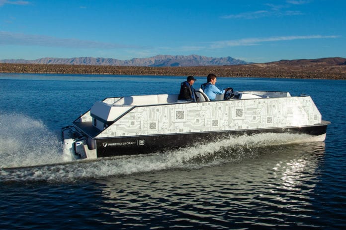 Pure Watercraft Electric Pontoon Boat.