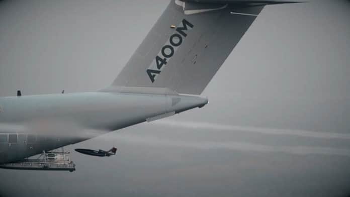 Airbus A400M airlifter launches Remote Carrier drones in mid-flight.