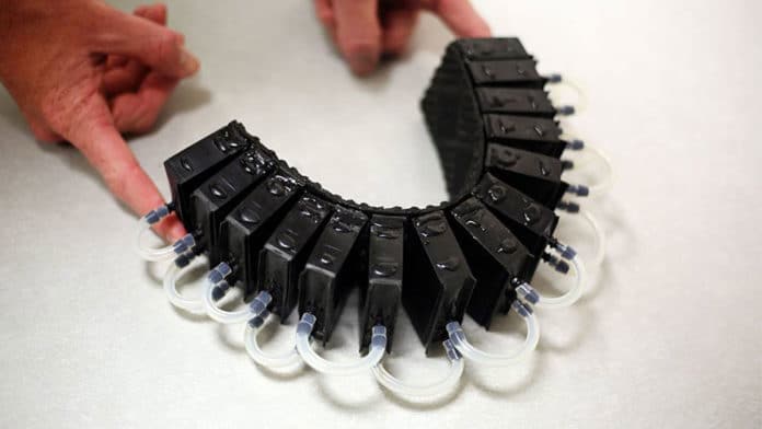 The soft-robotic assistive actuator prototypes work by using gas pressure to expand the internal chambers, causing them to bend.