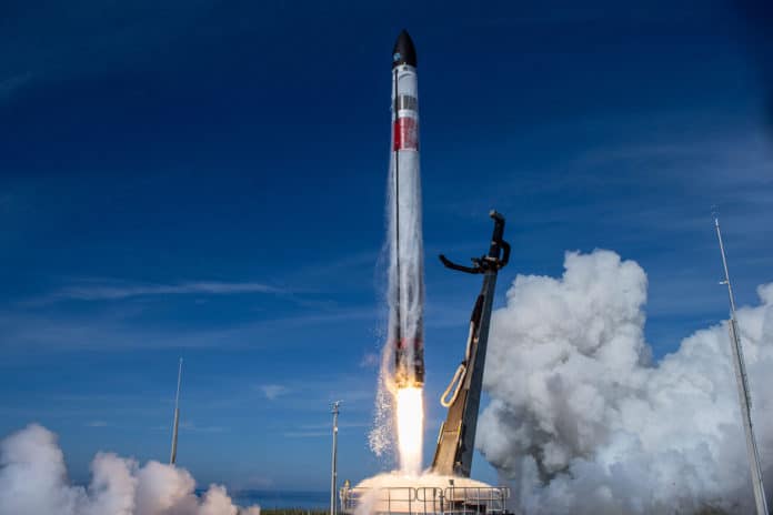 Rocket Lab deploys 34 satellites to orbit and catches rocket booster mid-air with helicopter.