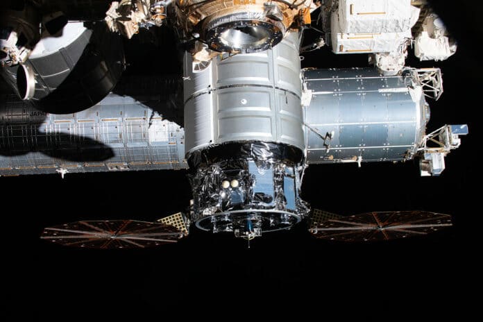Cygnus docked to the International Space Station prior to performing an operational reboost.