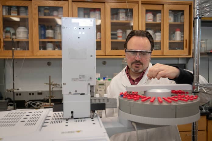 WPI Chemical Engineering Professor Mike Timko at work in his lab.