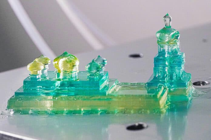 A model of Kyiv’s Saint Sophia Cathedral in the blue and yellow of the Ukrainian flag, made using the iCLIP method for 3D printing.
