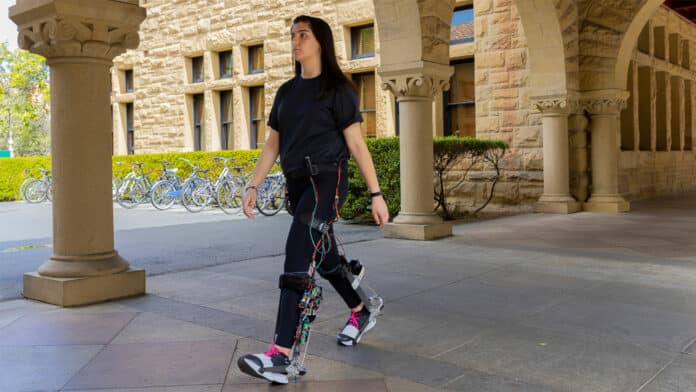 Ava Lakmazaheri, a graduate student in the Biomechatronics Laboratory, walking while wearing the untethered exoskeleton.