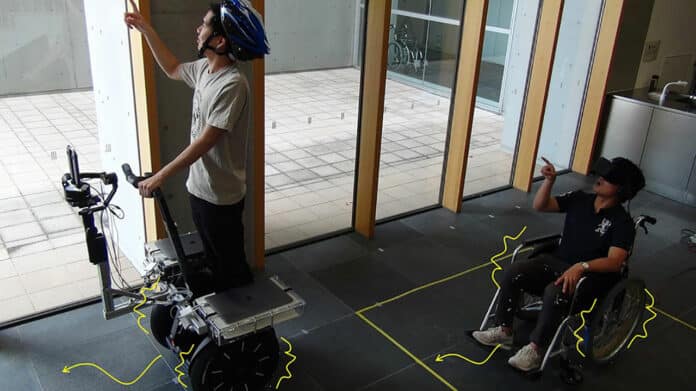 A wheelchair rider (right) who remotely collaborates with a Segway driver (left) can perceive both 3D visual images and vibro-vestibular sensation.