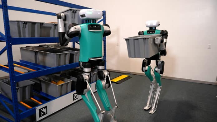 Digit robots can grab and move plastic totes.