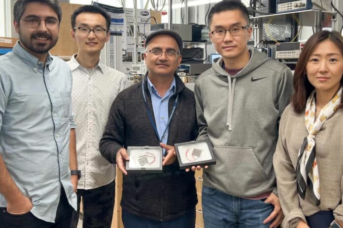 Amin Nozariasbmarz, Yu Zhang, Bed Poudel, Wenjie Li and Na Liu, left to right, researchers in the Department of Materials Science and Engineering at Penn State, display the thermoelectric modules they created.