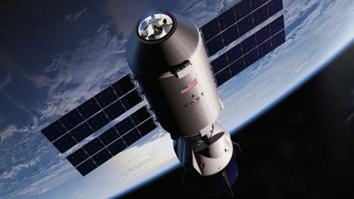 Illustration of Haven-1 with SpaceX Dragon docked and a visiting crew of four.