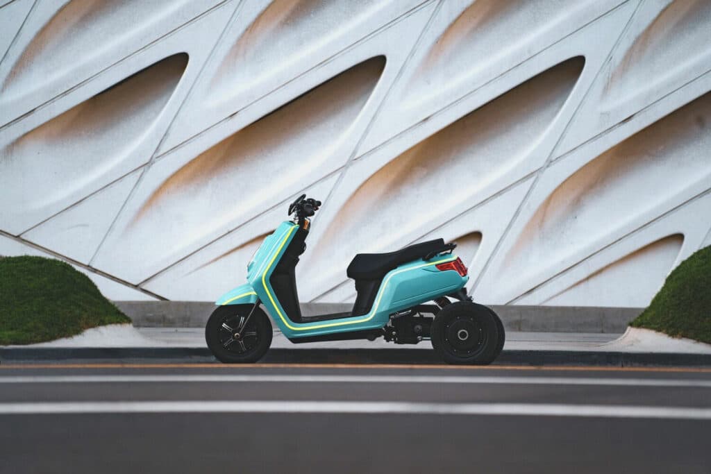 XOTO leaning 3-wheel electric scooter side view