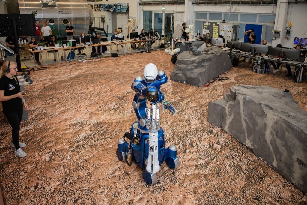 The Rollin' Justin robot in DLR's planetary surface test environment at the Agency's German Space Operations Center.
