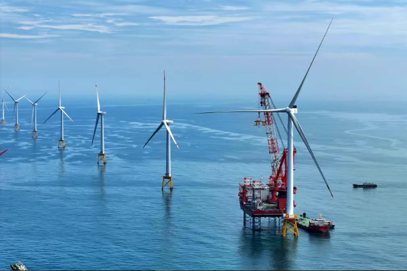 The image shows a 16-megawatt wind turbine installed at the Fujian offshore wind farm.