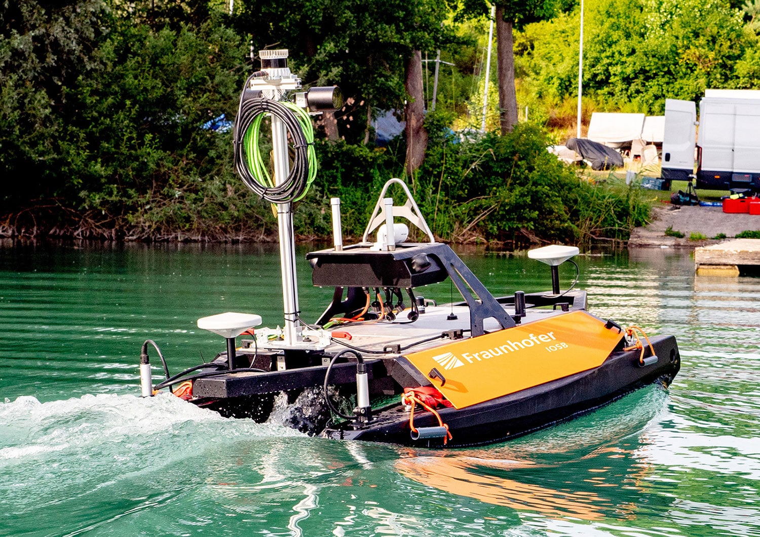 The USV in action, using the autonomous capabilities and sensors for underwater and above-water mapping fitted.
