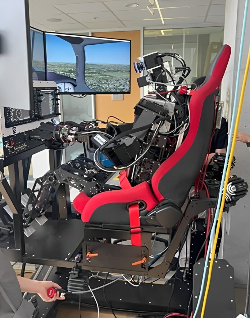 PIBOT operating a flight simulator. 