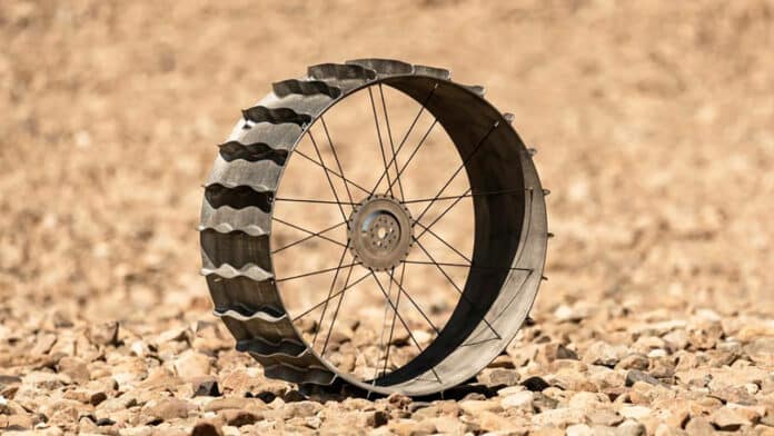 ORNL researchers used powder bed printing to create this lunar rover wheel based on a NASA design.