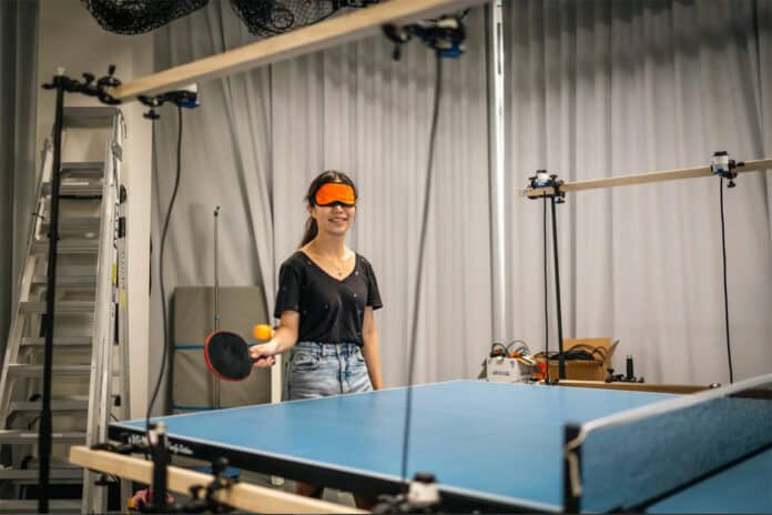 Motion tracking cameras and an array of linked speakers give real-time audio feedback to table tennis players with low vision.