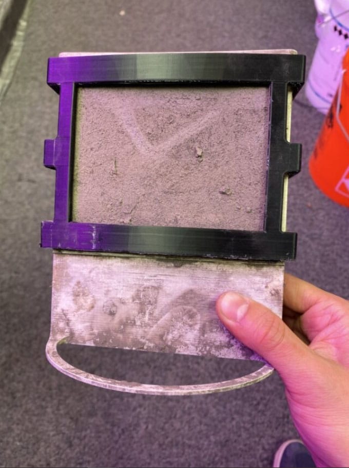The fuel cell, coated in dirt after being pulled from the ground.