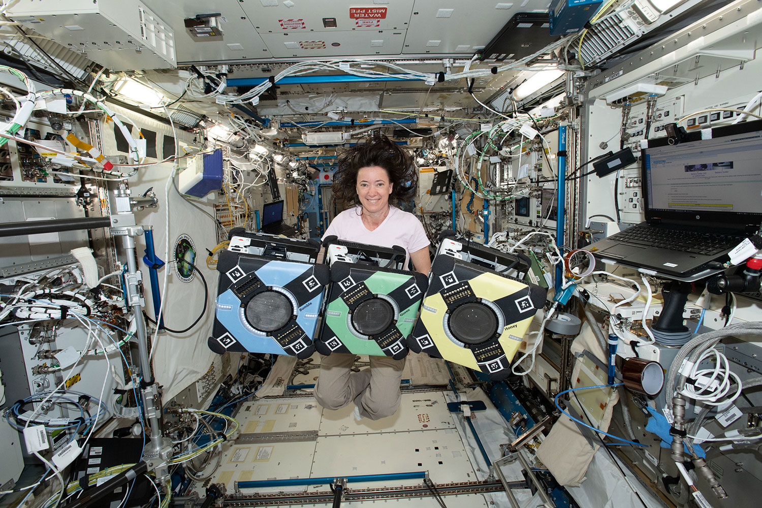 NASA astronaut Megan McArthur with the Astrobee robotic free-flyers