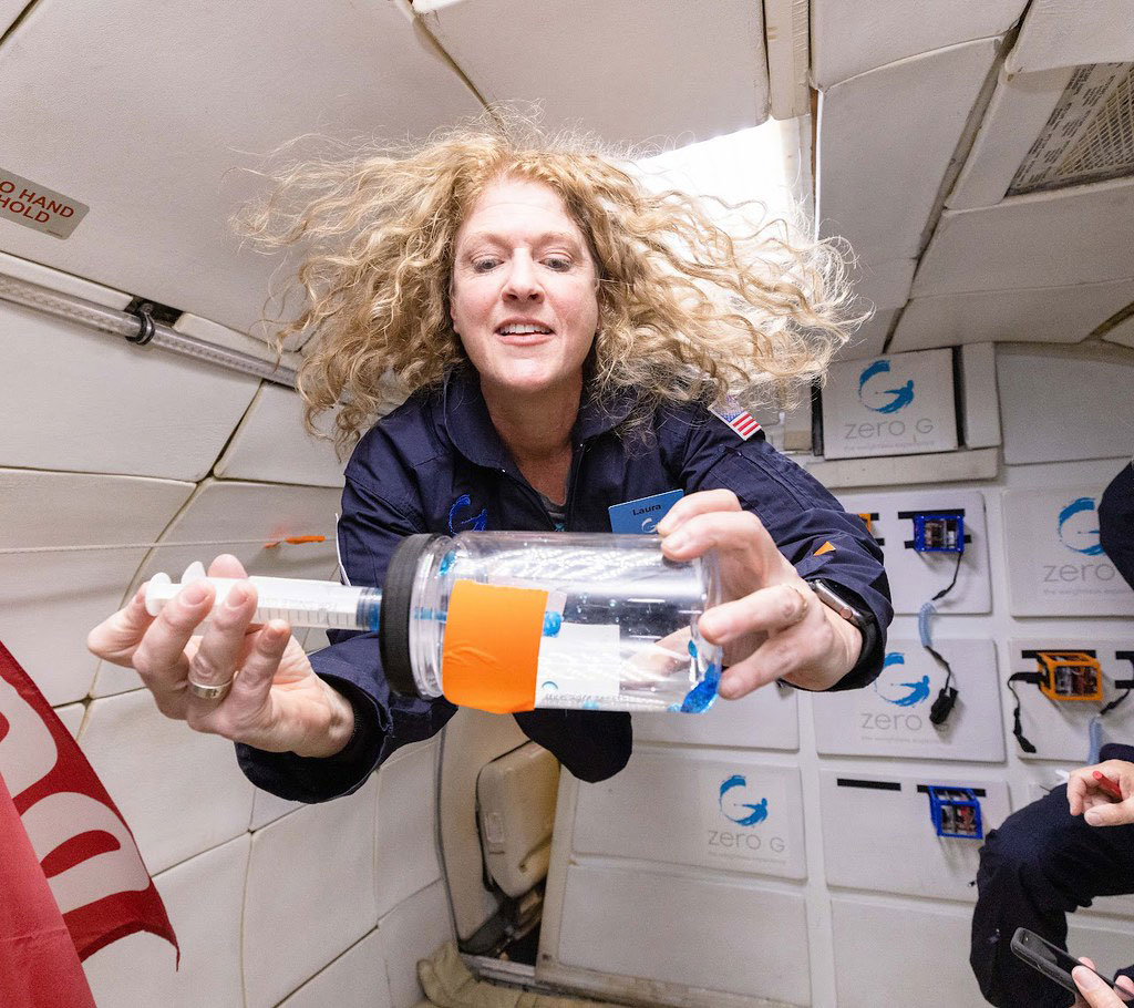 Space Station Ambassador and educator, Laura Tomlin, participating in a reduced gravity flight as part of the Embedded Teachers Program through Carthage College (NLRA Award Recipient 2022 and 2023).